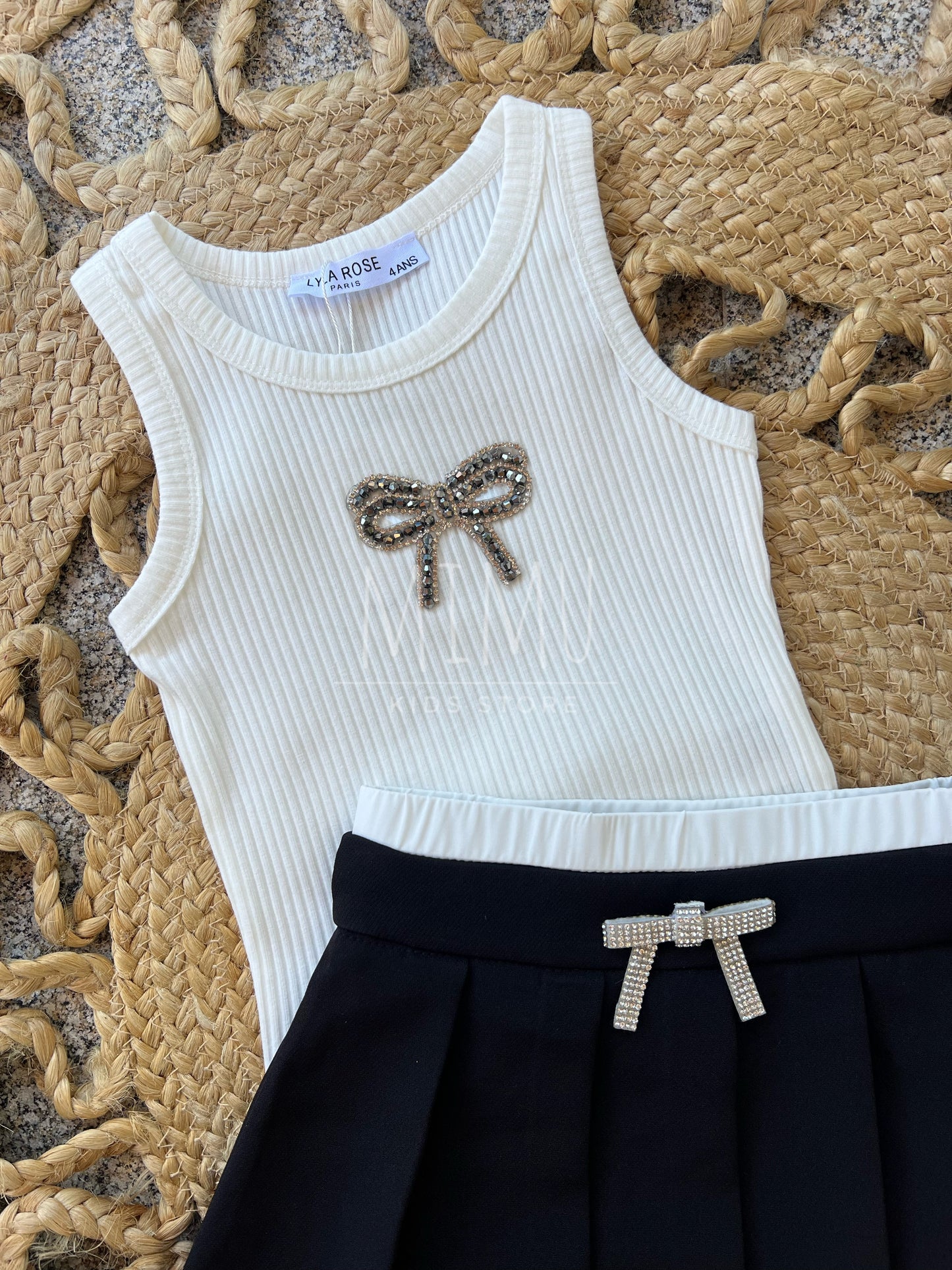 Pleated skirt with bow and ribbed bow top (items purchased individually)