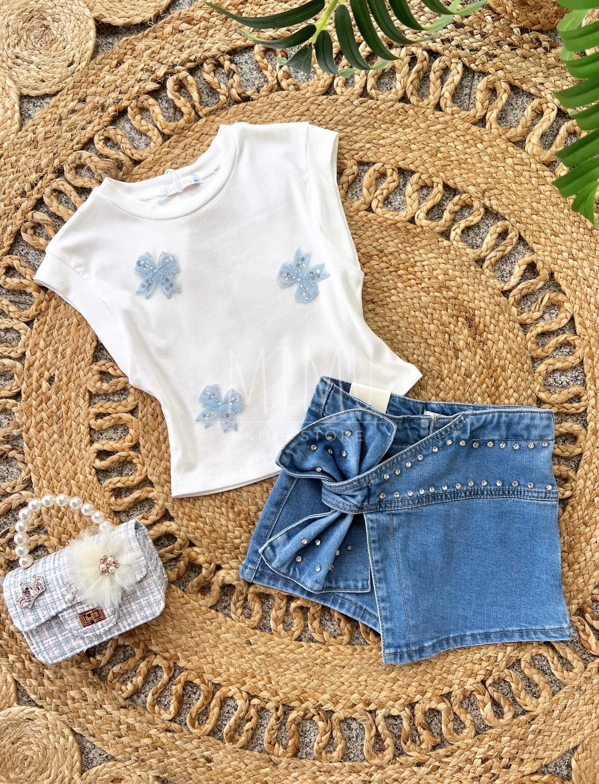 Skirt, shorts and top with bows (items purchased individually)