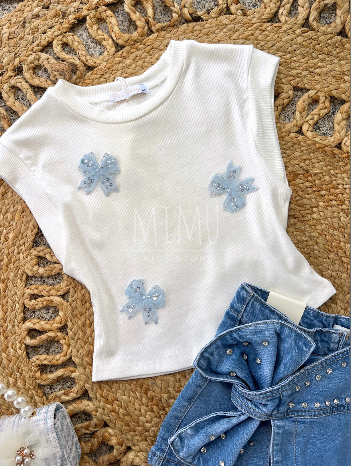 Skirt, shorts and top with bows (items purchased individually)