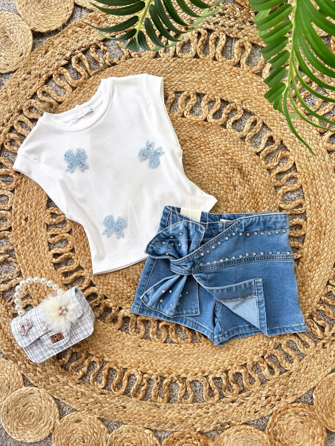 Skirt, shorts and top with bows (items purchased individually)
