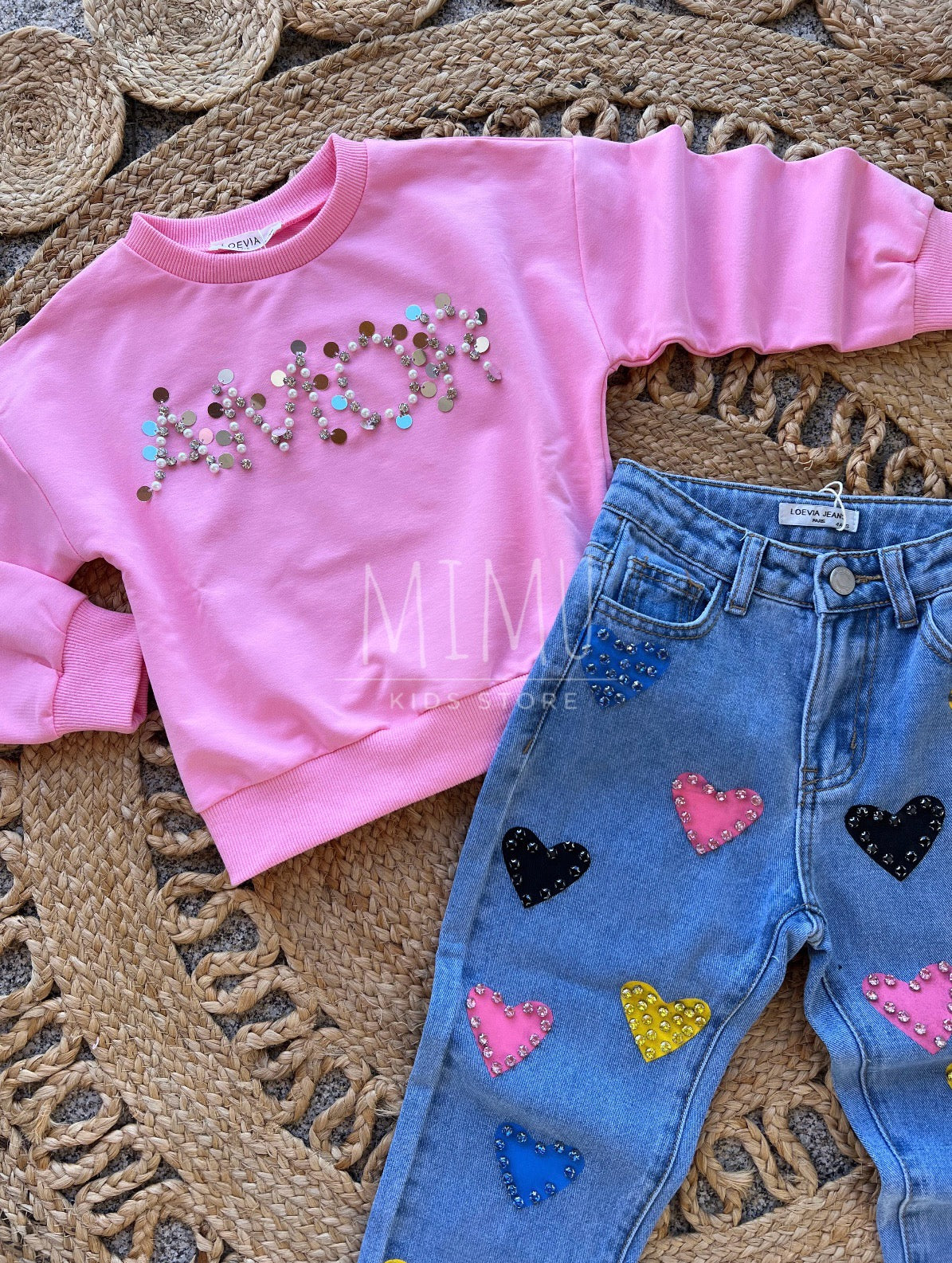 Heart-shaped pants and sweater (items purchased individually)