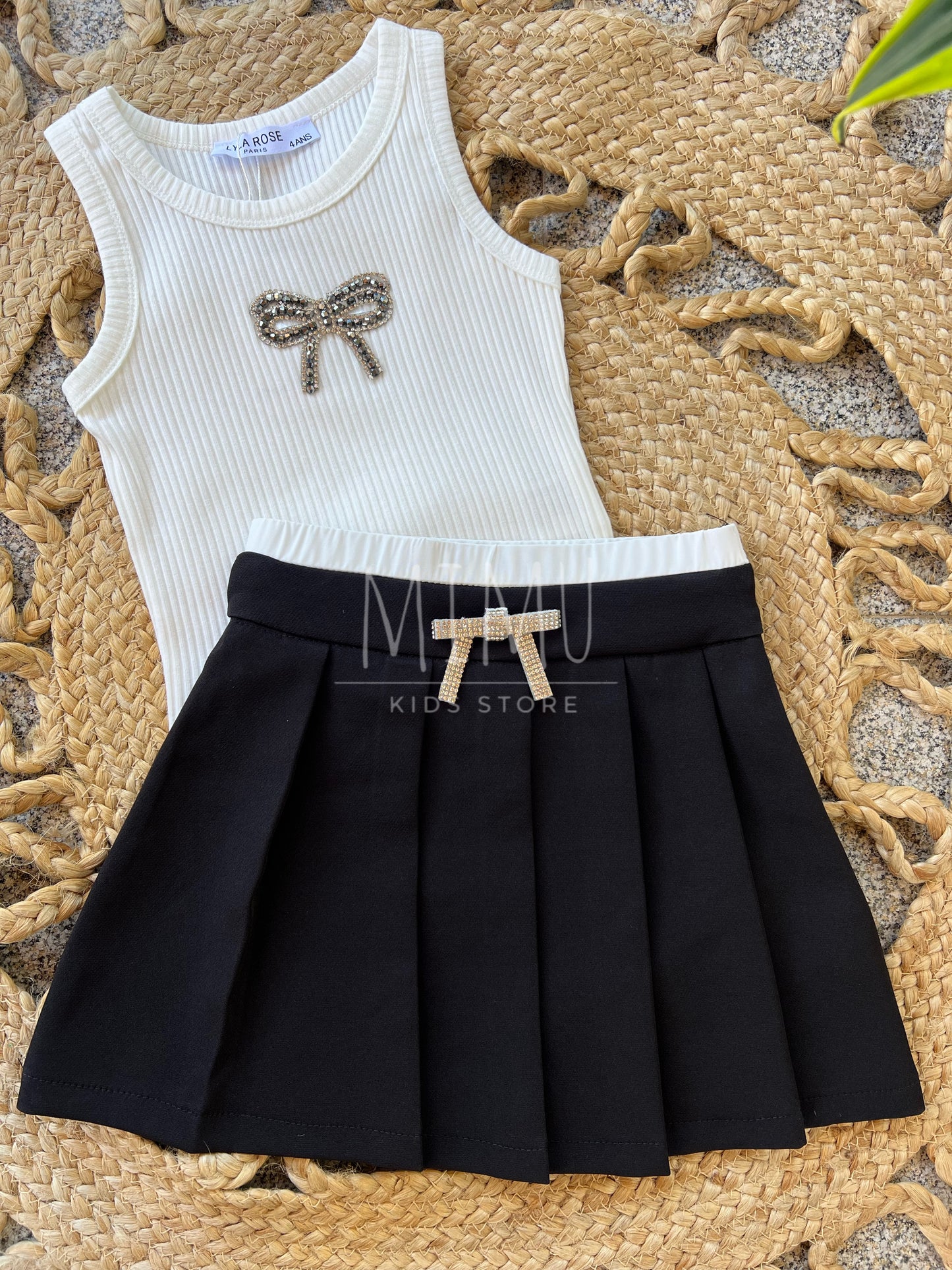 Pleated skirt with bow and ribbed bow top (items purchased individually)