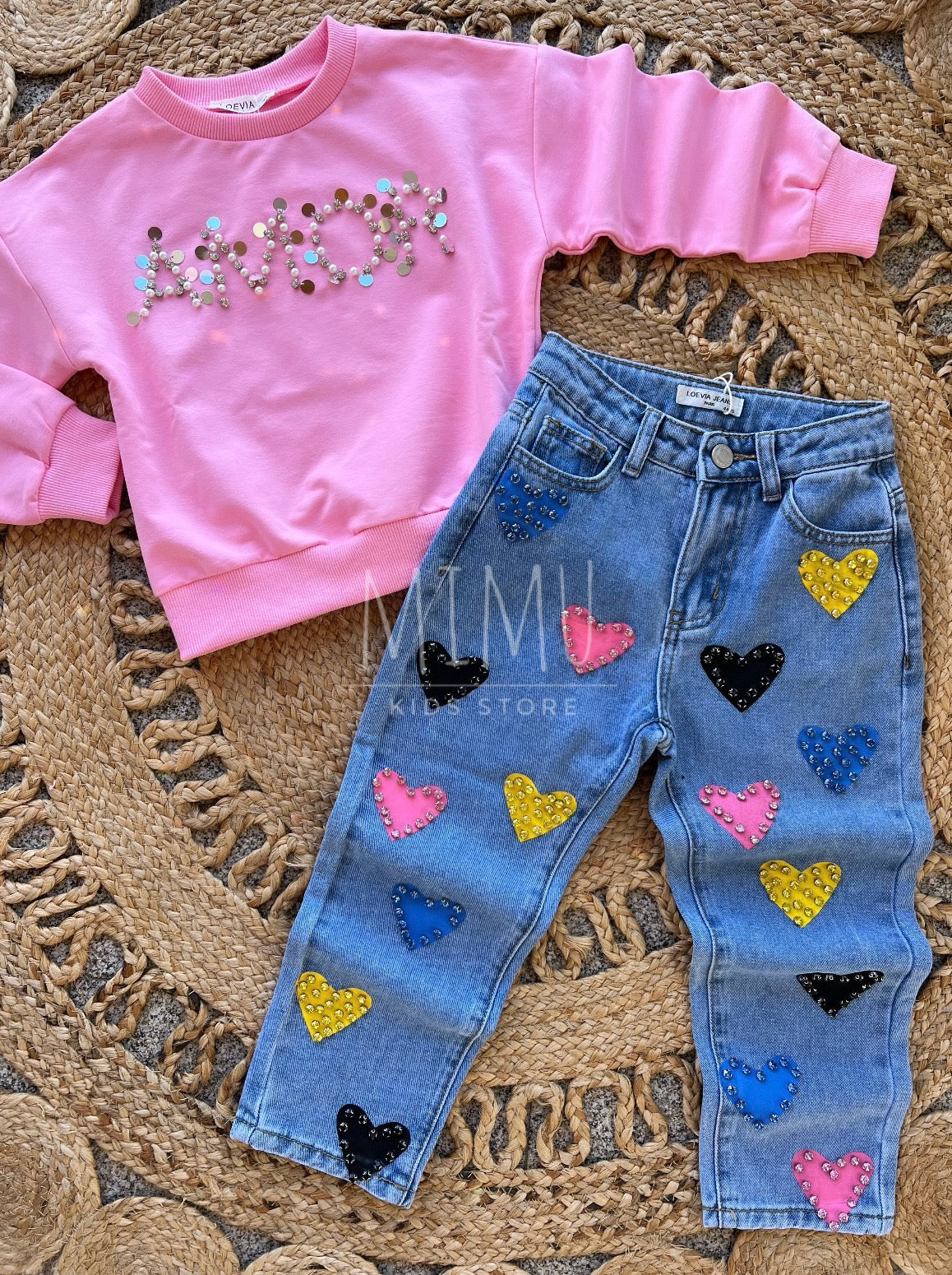 Heart-shaped pants and sweater (items purchased individually)