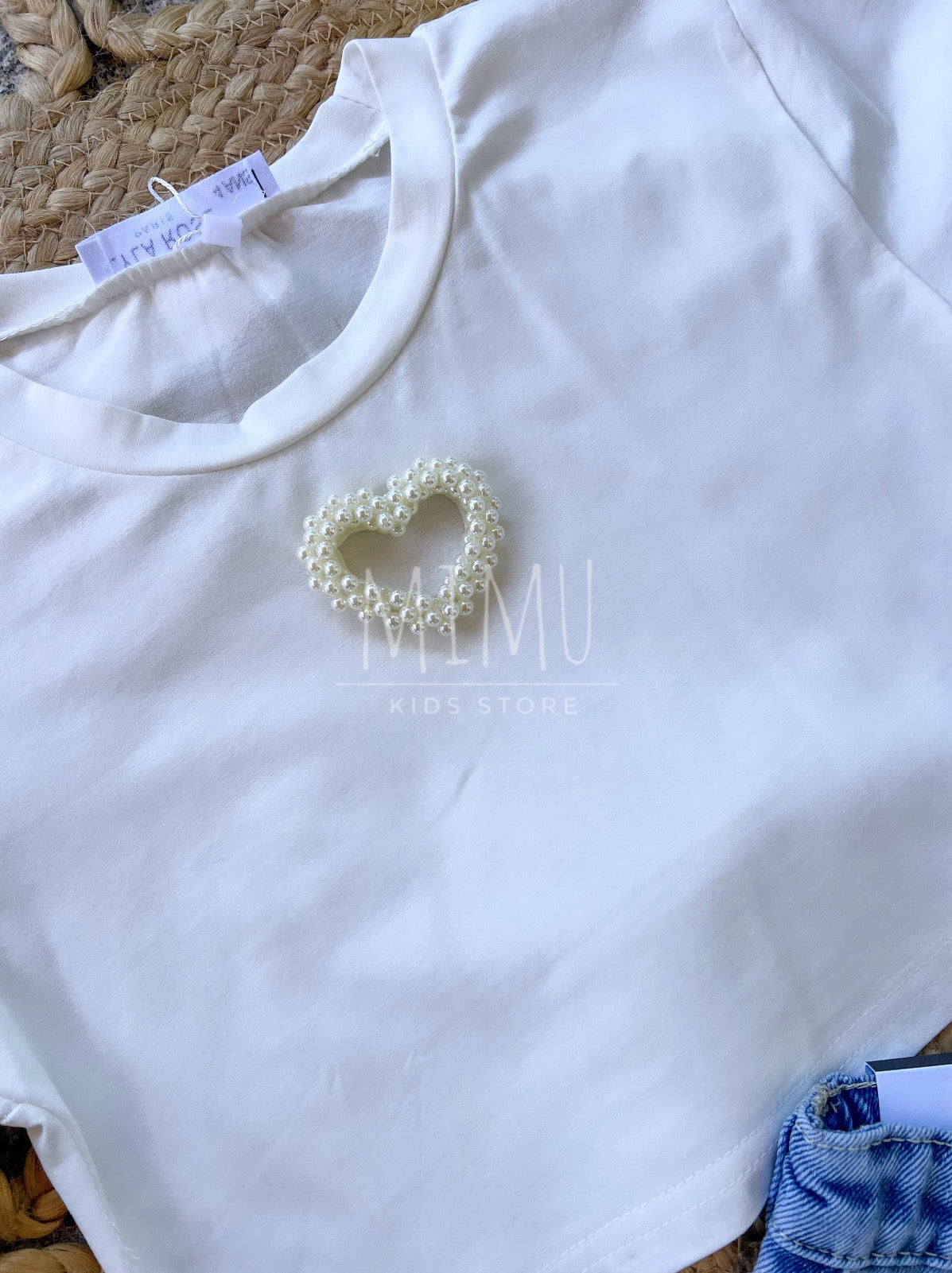 Shorts with rips and Cropped heart T-shirt (items purchased individually)