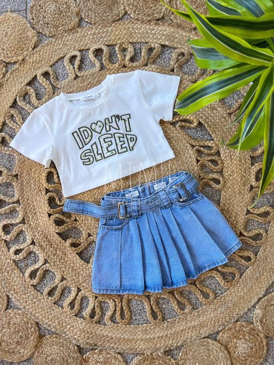 Denim skirt with pleats and Cropped “I don't sleep” T-shirt (items purchased individually)